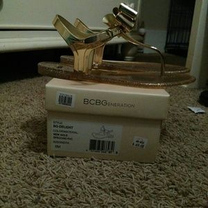 Women's gold bow sandals